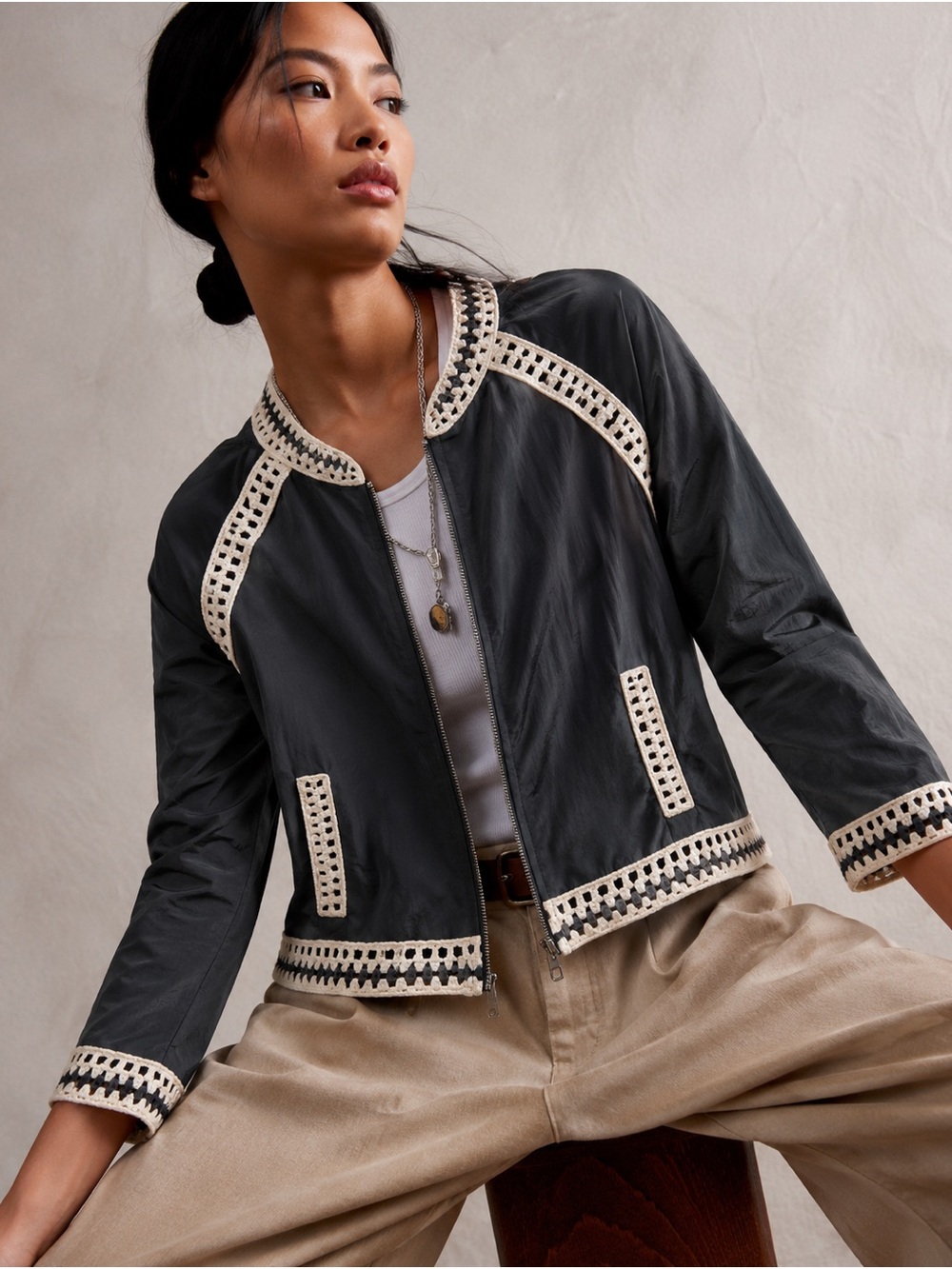 RARE- sz: Small- Free People Black Bomber Jacket with Cream crochet trim.